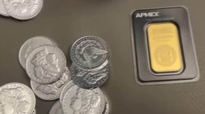 silver coins and a gold bar